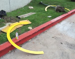 The rings were painted yellow to match the vertical cans